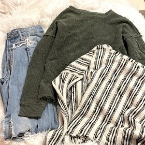 2 tops and 1 pair of ripped jeans